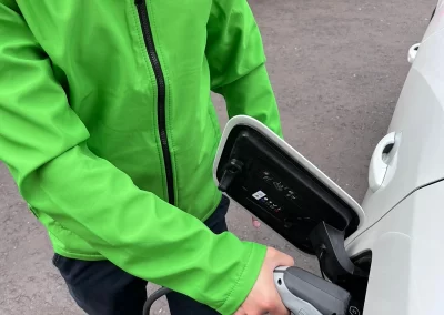 Electric vehicle plugged in charging
